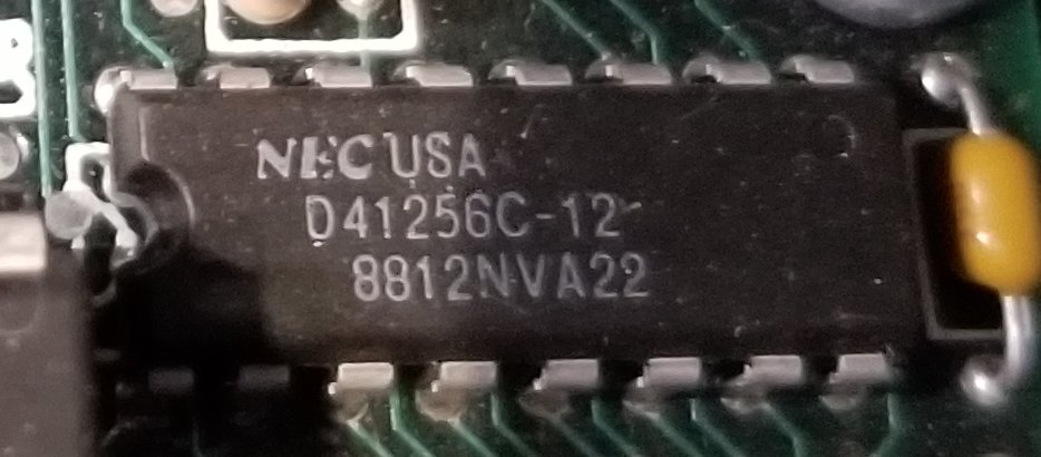 I missed it at first, but near that SRAM chip there's 8 of these NEC D41256C-12s. These are DRAMs, 32 kilobytes each.So that's 32*8, 256 kilobytes in total.