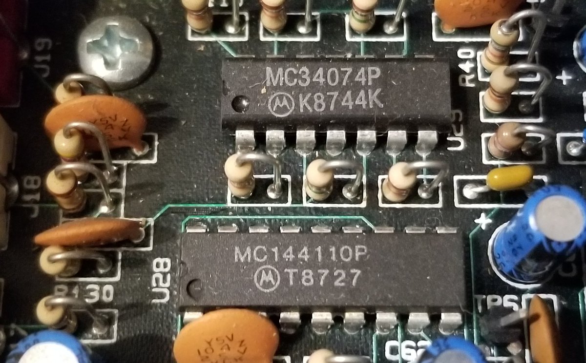 Over here, we've got a MC34074P op-amp, and a MC144110P 6-bit digital-to-analog converter.