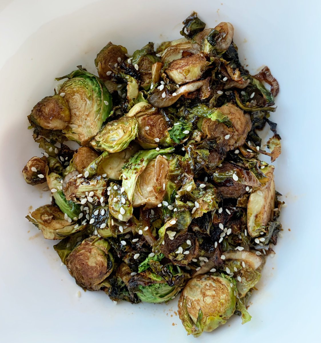 Balsamic Roasted Brussels Sprouts - super easy + fool proof because they taste better a little burnt  Full recipe here -  https://whereshebegins.com/plant-based-bre/2018/1/9/balsamic-brussel-sprouts |  #plantbasedbre