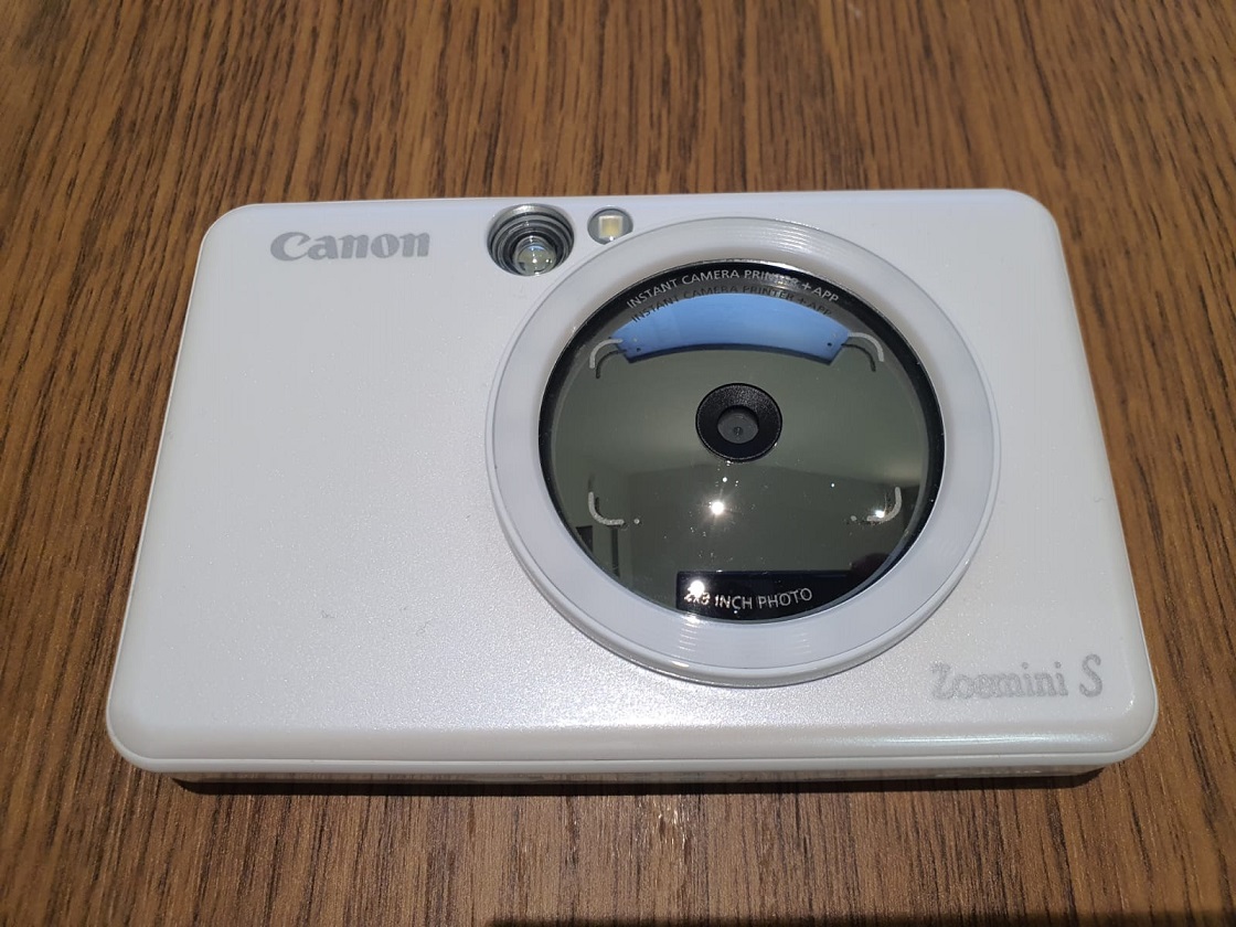 After getting a QR code for each shard I took polaroid photos with my wife's Zoemini S. This camera takes insta photos and has no memory for storing. So this is ideal for getting a backup of each shard. You can find many cheap cameras like this on the market.