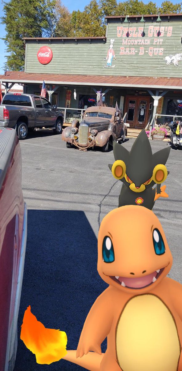 ShinyPooch's tweet photo. Earlier today I was catching some Charmander for #PokemonGOCommunityDay at a local BBQ joint and they got a badass Mad Max Halloween decoration in the parking lot. https://t.co/qegk0PHl98