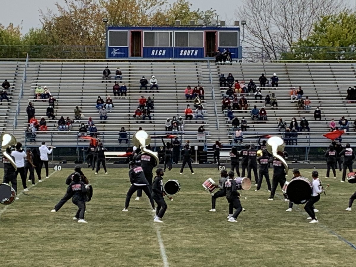 Nothing can stop the Rich Township HS Mighty Marching Machine! Not Covid - check out the masks &amp; social distancing - and certainly not a little breeze. GO RAPTORS! #RichinStudentSuccess