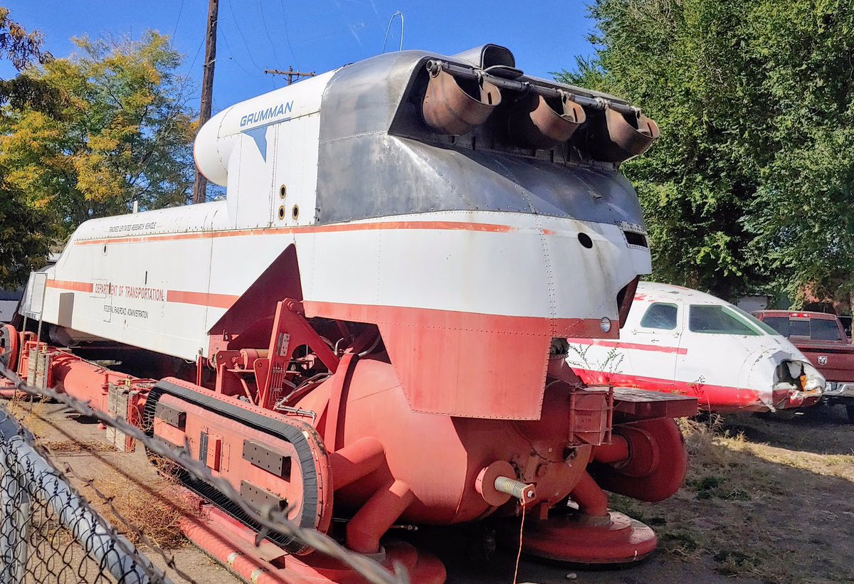 Oh, that? Just a selection of 1970s era experimental hovertrains designed to go up to 300 mph, now sitting abandoned along a random side street in Pueblo, Colorado.