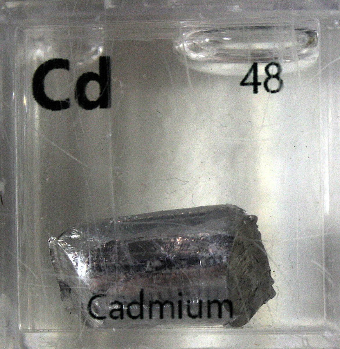 Cadmium  #elementphotos. White compound is cadmium sulfate (CdSO4.2.67H2O).