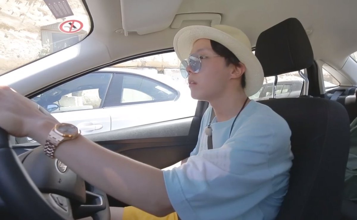 hoseok in malta wearing sunglasses while driving single handedly will be the end of me