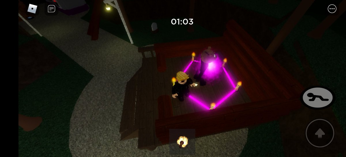 Roblox ritual gameplay reference Roblox avatars completing a candle ritual in a dark game environment