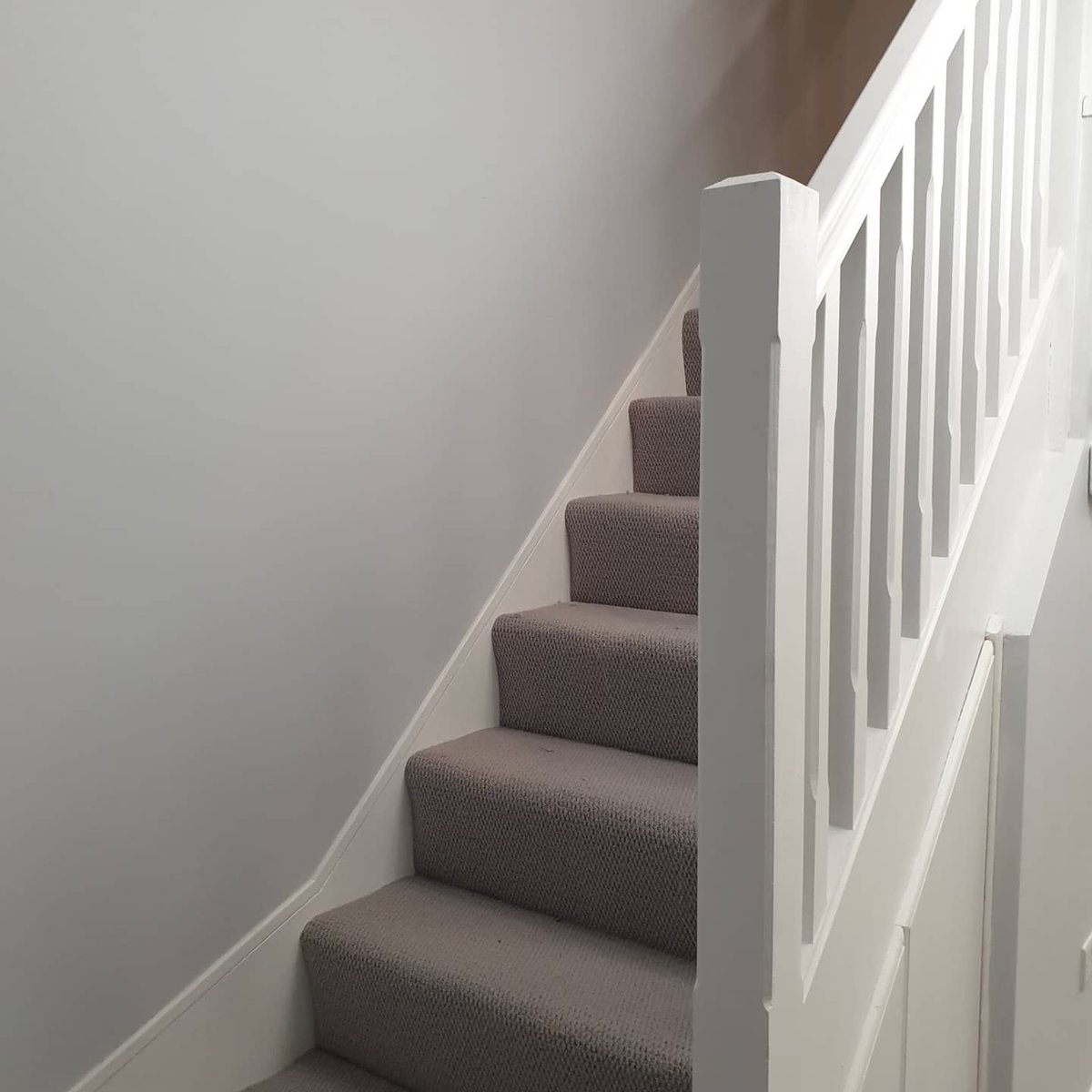 Hallway, stairs and landing completed in Necklace grey from Tikkurila, woodwork done in satinwood by Johnstone's. Looks lovely don't you think?! #Manchester #necklace #grey #hallway #fallowfield #satinwood