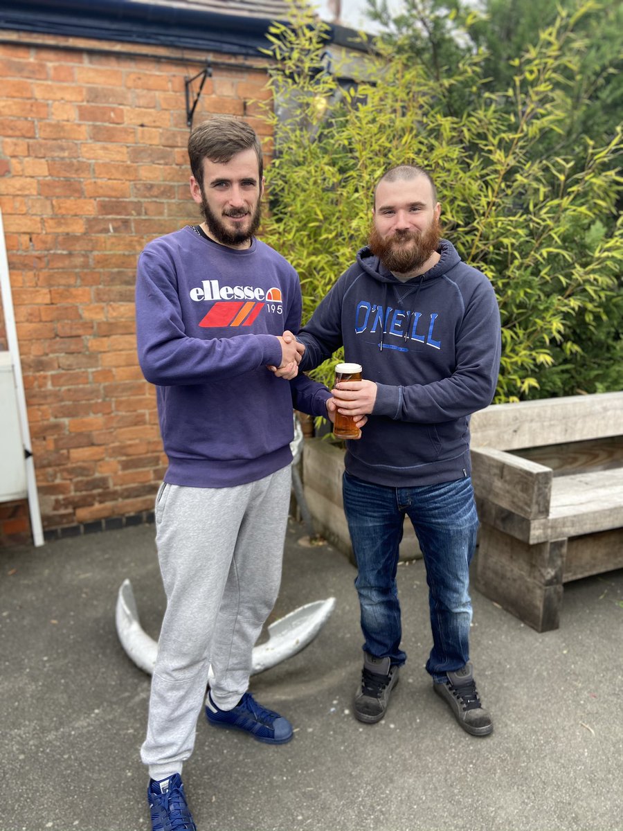 FCBurbageMens's tweet photo. Today's M.O.T.M Adam Morris, for a great assist and overall performance, with his free pint handed to him by Captain @lyndonrjn16 💚⚽️⚓ https://t.co/VeBH1hizbR