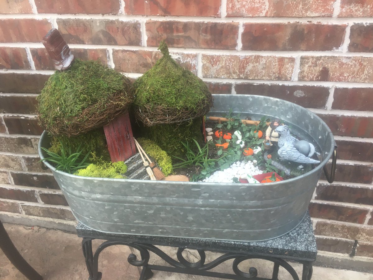 HeatherAlbuque1's tweet photo. @jk_rowling our family loves HP so much I made this fairy garden for my cousin! https://t.co/8G3zcdY1aO