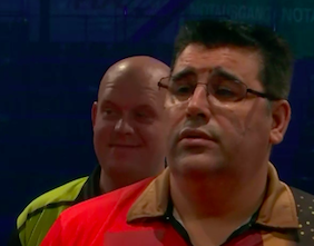 HighRollerRadio's tweet photo. The look on Michael's face, though!!!!!

Strangest finish ever to win tourney, treble eight, double 14, double 18...THE 88!

No, the DE SOUSA!!!!
Champion #ET3 #EDGP20 #Darts #Germany https://t.co/5SXoEhjPvV