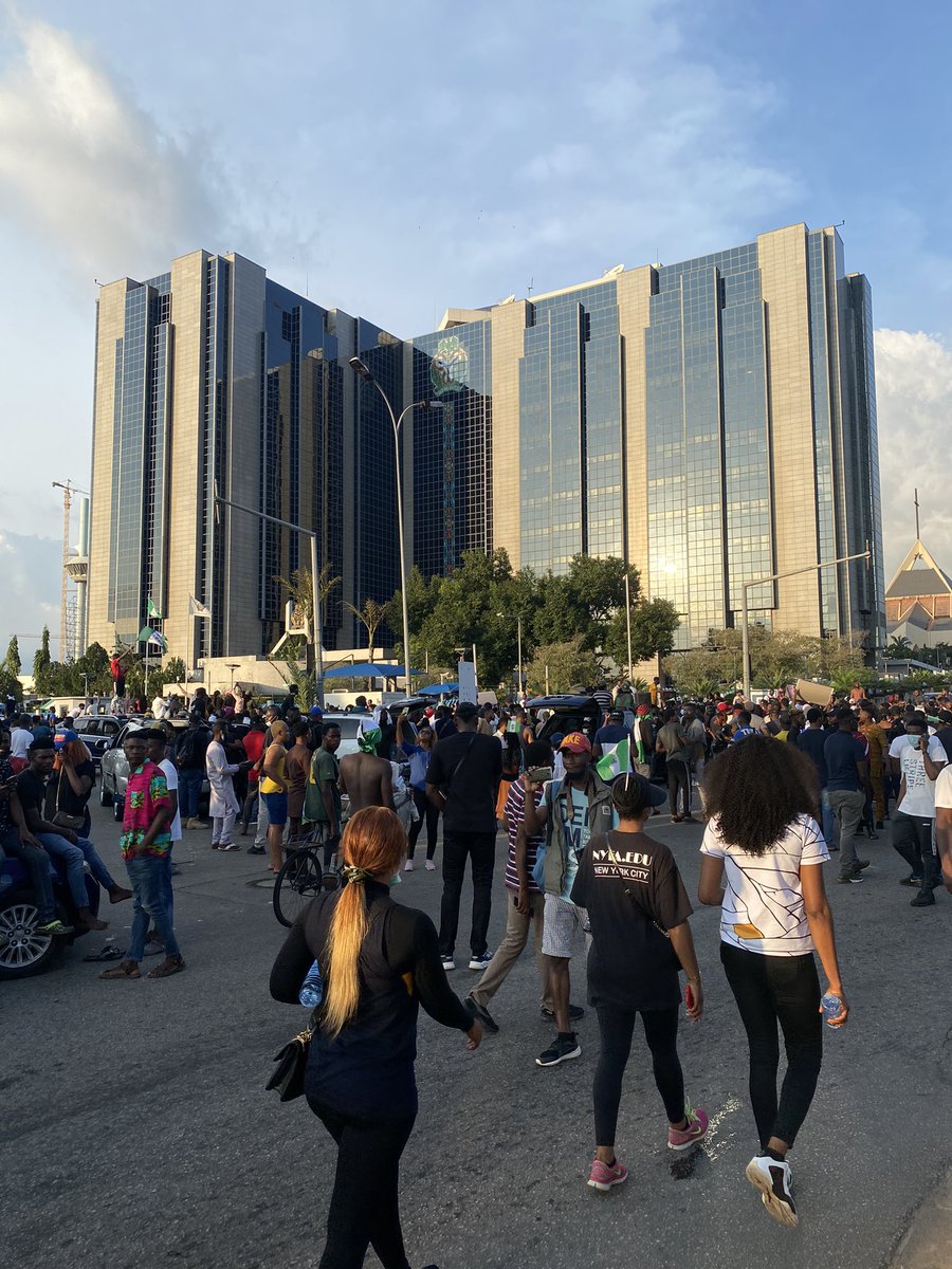 This is CBN HQ, Abuja. Protesters will be sleeping here while more will be joining tomorrow. There are provisions for tents, mobile charging spots, mobile toilets, WiFi, etc.No one is resuming to work at CBN tomorrow. It is a public holiday for oppressors.  #ENDSARS    #OccupyAbuja