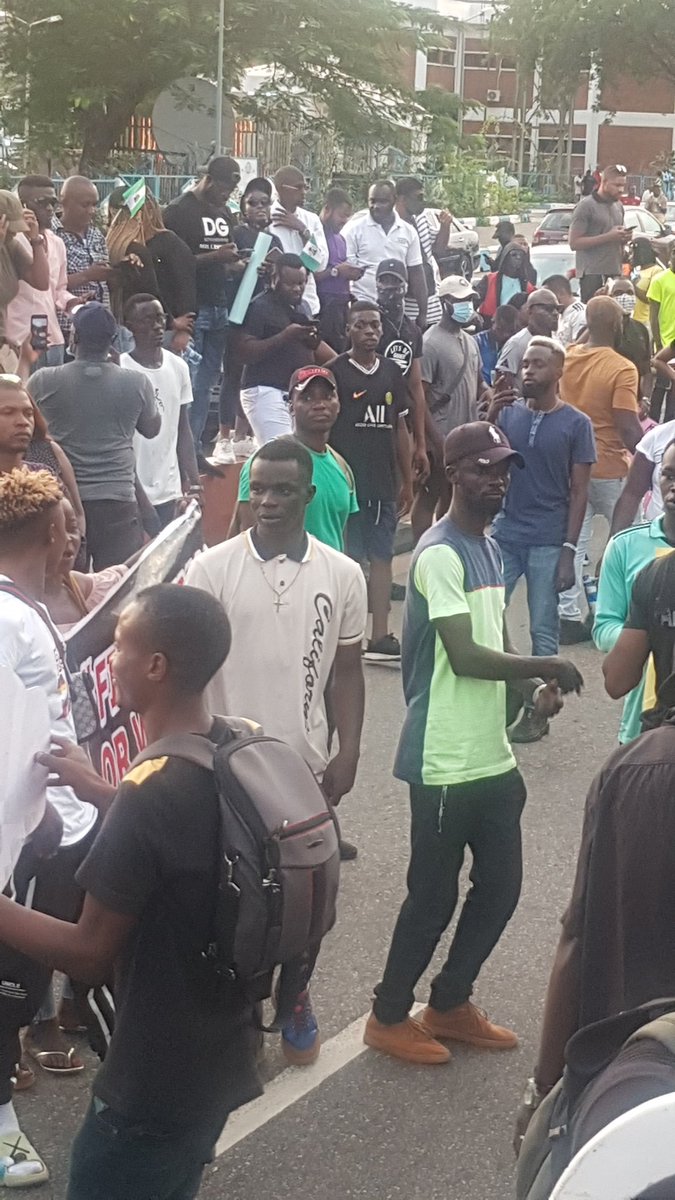 EiENigeria's tweet photo. Protesters sick &amp; tired of Police brutality in Nigeria have now occupied the CBN HQ in Abuja.
At the same time, protests are ongoing at different locations across the country. 
No going back ✊ Justice ✊
#EndSARS https://t.co/XbrJBIb7uI