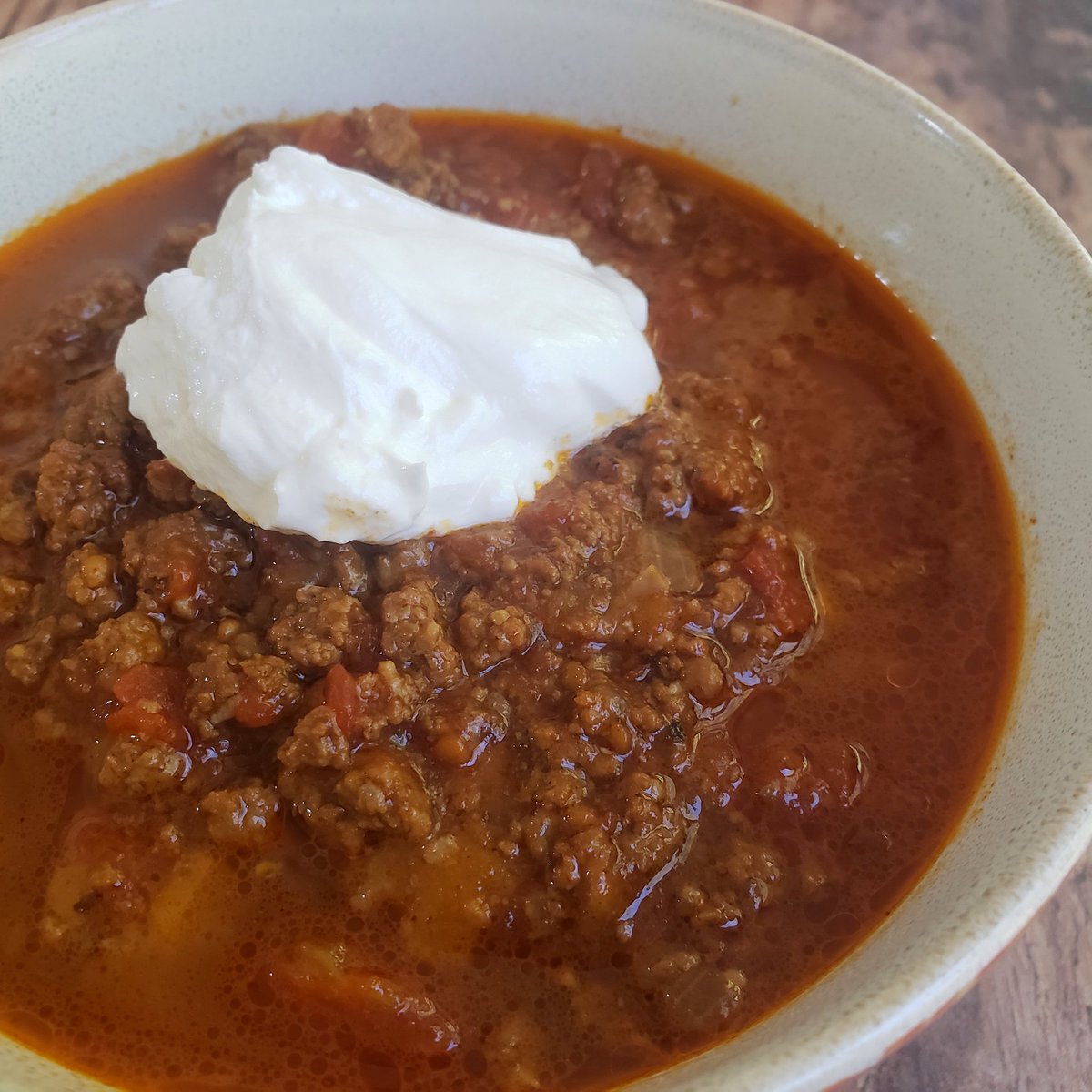 It's finally chili weather! 🍂

Sam made this in the Instant Pot yesterday and it heated up just as yummy today! I stirred in 1.5 slices of cheddar cheese and topped it with some sour cream. So good and so perfect for fal!l 🥰 #keto