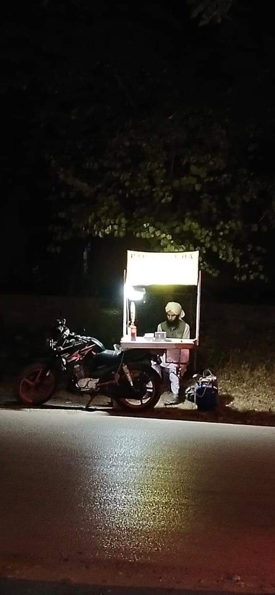 So i was just riding on my bike and i looked that guy wearing imama who was studying some sort of University notes under the light of his stall (which was designed on his YBR) in front of ABUBAKAR MASJID G-11/1 isld (commonly known as abu bakr market)