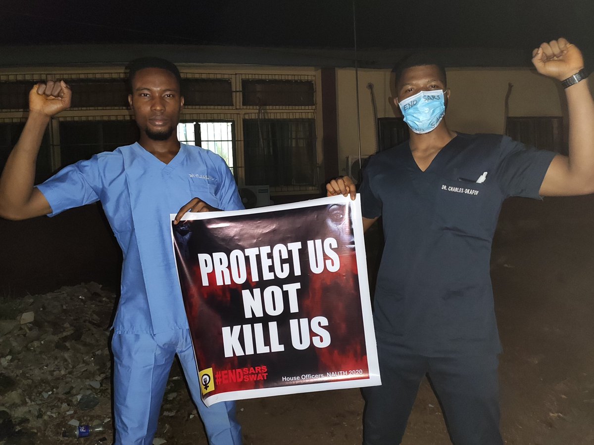 DrLotenna's tweet photo. Happening now @ NAUTH.
Doctors &amp; Health workers are protesting SARS &amp; holding a candle light procession for our fallen compatriots 🕯️. 
People are sharing heartbreaking stories! 
We will not be silent! 
We will not be tired!
We will soro soke!
#EndSARS 
#DoctorsayEndSARS https://t.co/52sV4uVJvE