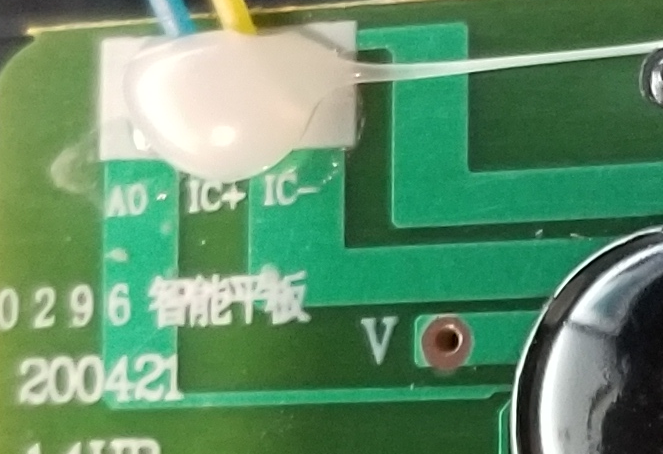 There does seem to be a trace for the A0 connector, which I assume is for DEMO. I wonder if it acts differently if I short that to ground (or power? I'm not sure which it needs)There's also a "V" pad that's unpopulated.