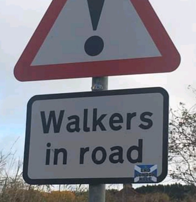 41. The 1320 mile indy walkers stickering the road to Turriff in Aberdeenshire today. Know them by their deeds.  #vandals4indy