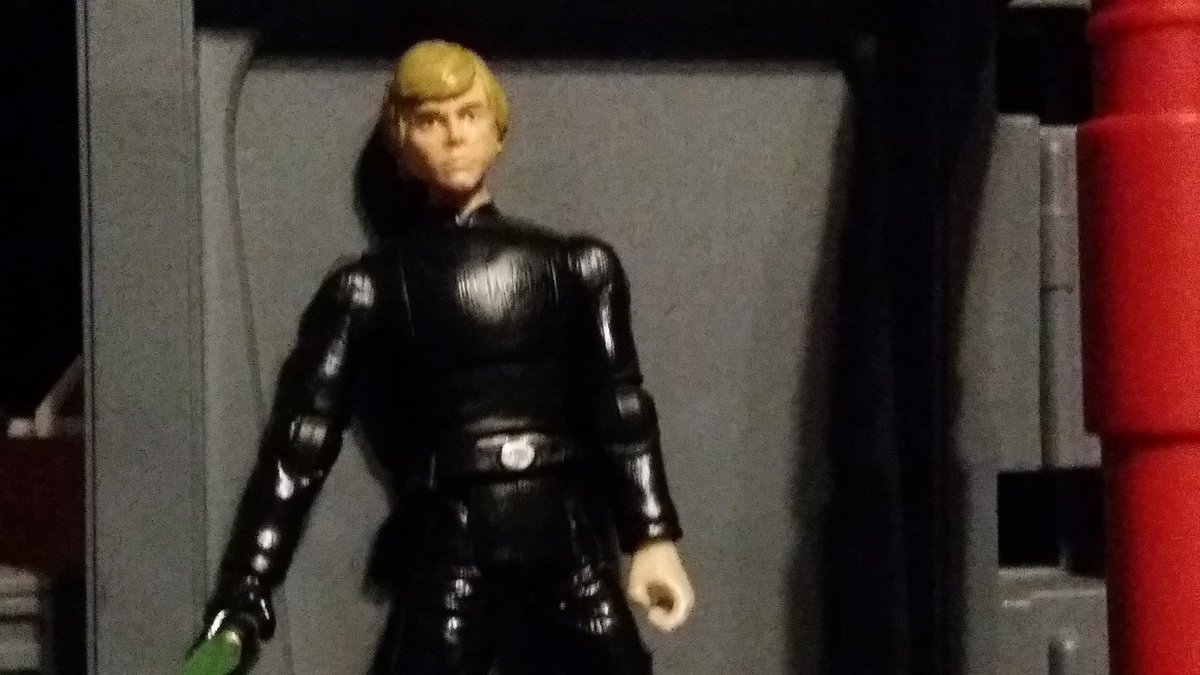 For this figure, I cut off a holster from a spare Yavin Ceremony Luke figure's belt and glued it on. I tried to make the belt from a Black Series Luke fit, but it wouldn't.