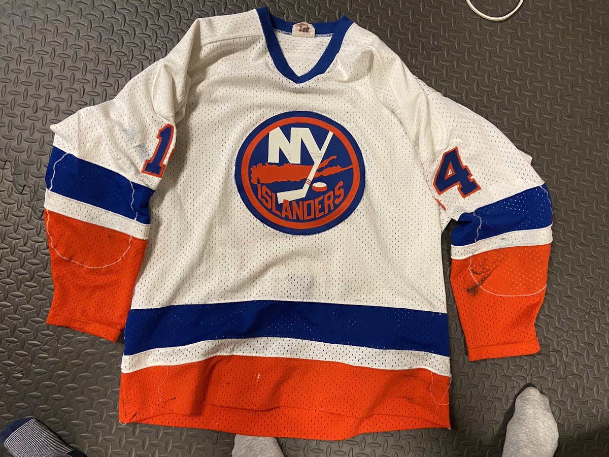 Going through an old bin of jerseys at Mom’s would you care to see some? Stating with, Dad’s game worn Islanders jersey, has to be from the 70s, can’t get over the weight of it. The letters/numbers themselves gotta weigh five pounds: