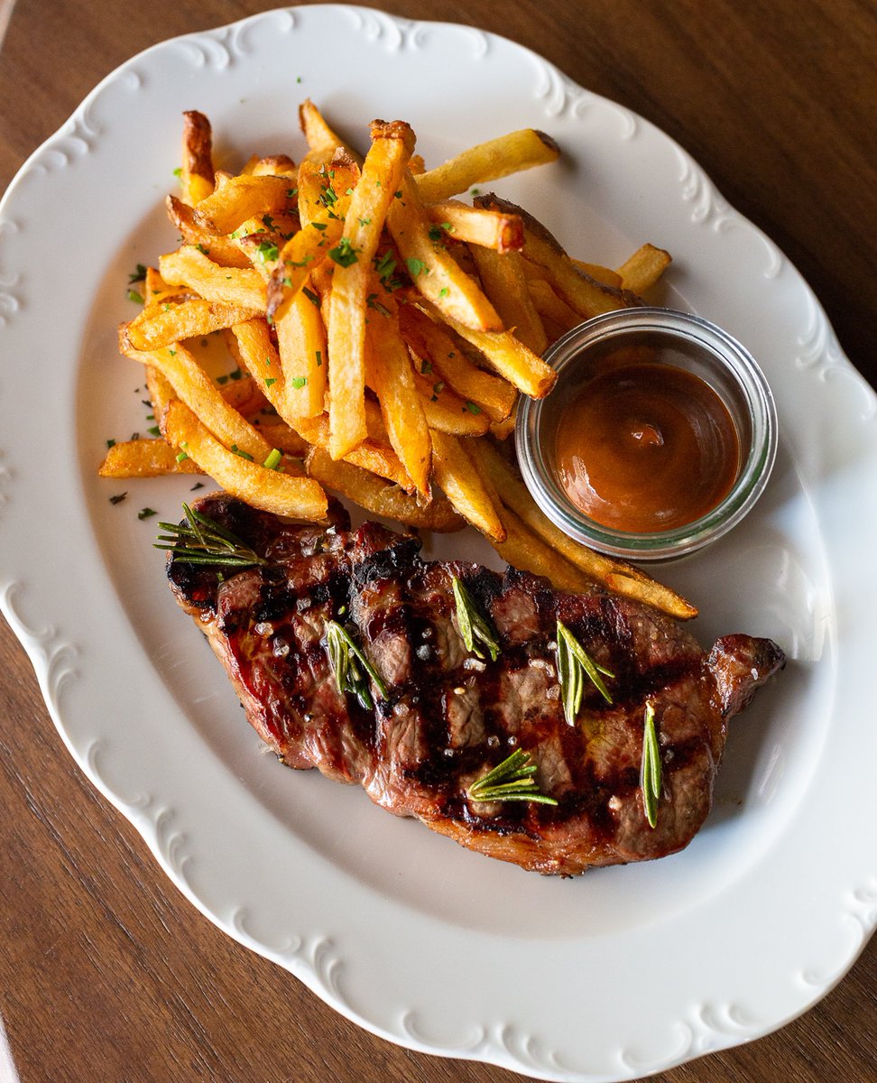 New York Steak Frites 8oz NY steak served with french fries and house-made steak sauce 🥩⁠
⁠
〰️〰️⁠
⁠
Outdoor patio dining is OPEN with proper social distancing protocols⁠