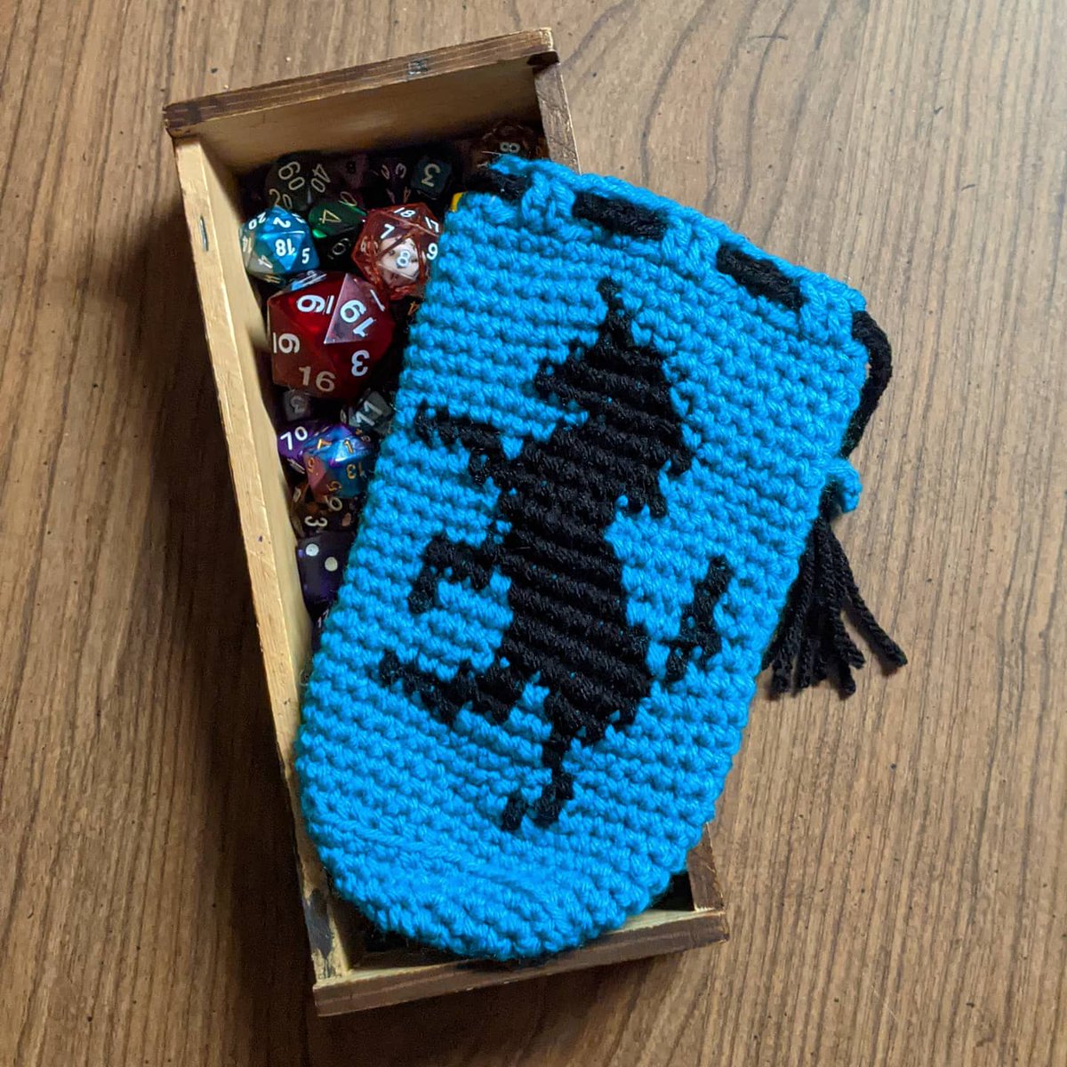 My unicorn dice bag is done and fits around 6 full sets of standard size dice (plus 2 mini sets & 2 large d20s) 😁! 
.
.
.
#dicebag #crochetdicebag #unicorndicebag #unicorncrochet #dnddicebags #crochetersofinstagram #crochet