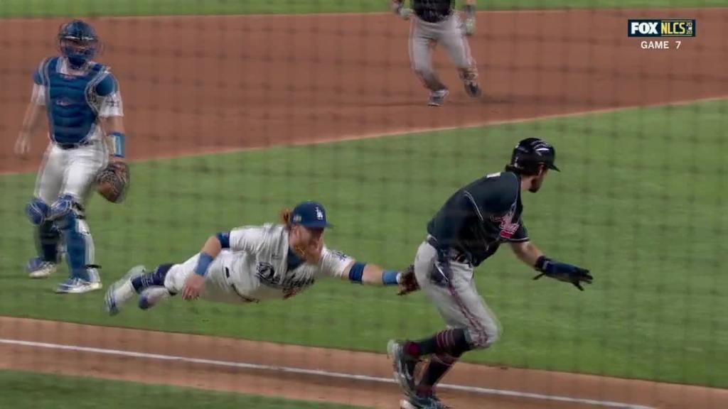 espn's tweet photo. The superman tag out from Justin Turner 👀

Leaving it all on the field in Game 7. https://t.co/YYAPAoLuIU