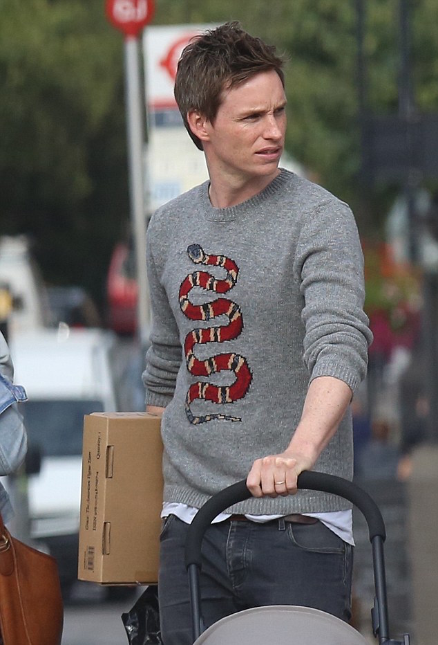 Eddie Redmayne, I'm convinced of it, simply loves to roll his sleeves up.