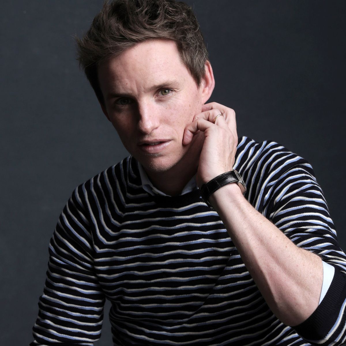 And so was born my theory, which is as follows: Eddie Redmayne likes to roll his sleeves up in real life, so much so that he makes sure it happens to almost all his characters on screen. Here are some photos of Eddie Redmayne irl.
