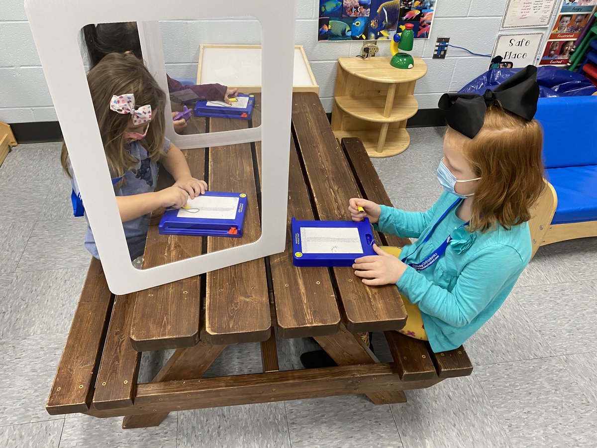 Ms. Courtney McReynolds preschoolers at @Rockfield_Elem are doing a great job demonstrating proper mask wearing AND proper letter formation as they practice writing the letter T on their @hwtears stamp and see screens. Way to go! #wcpspreschool #wcpsleads #maskupky #growingminds