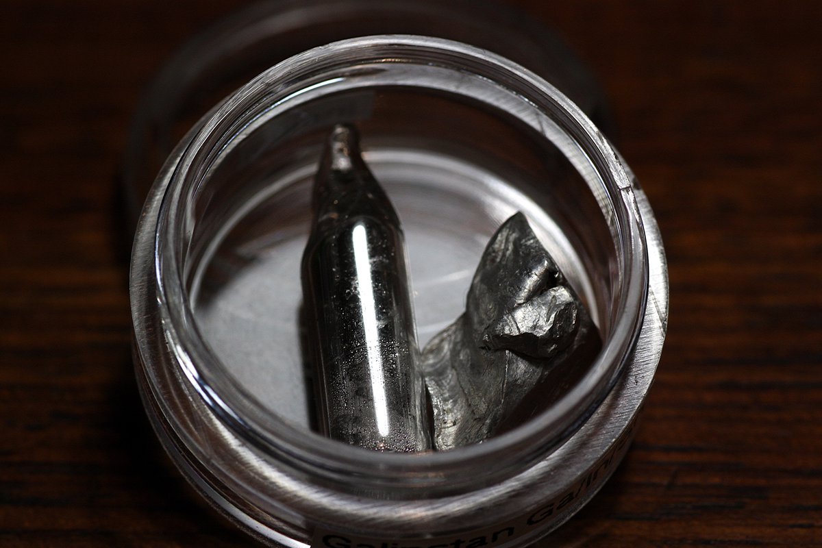 Indium  #elementphotos. Ampoule contains some home-made galinstan, an alloy of gallium, indium and tin which is a liquid at room temperature.