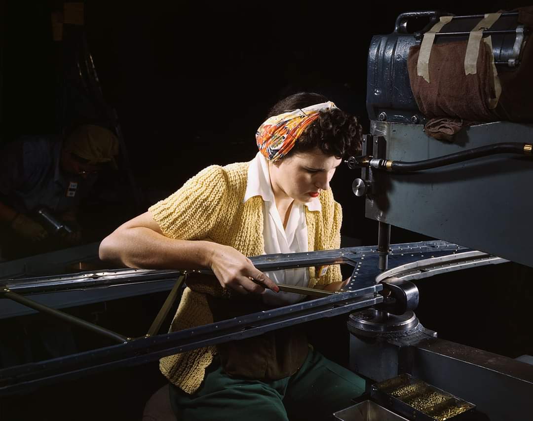 19 & final/A young woman riveting machine operator at the Douglas Aircraft Company plant joins sections of wing ribs to reinforce the inner wing assemblies of B-17F heavy bombers. Long Beach, CA. October 1942.Just one woman of many who helped to make victory in  #WW2 possible.