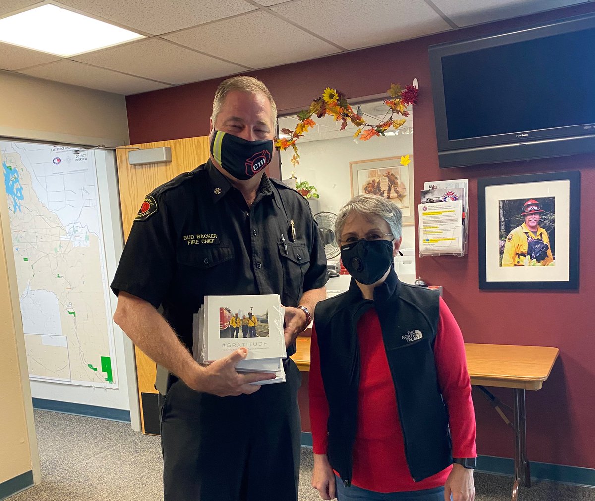 EastPierceFire's tweet photo. On Friday we received a stack of photo albums that express the #gratitude of the Sumner View neighborhood for the firefighters who saved their homes during the #SumnerGradeFire. We are moved by the gesture. https://t.co/CXKJXXe5Ak