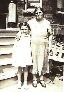 This is a photo of my grandmother standing next to her grandmother.