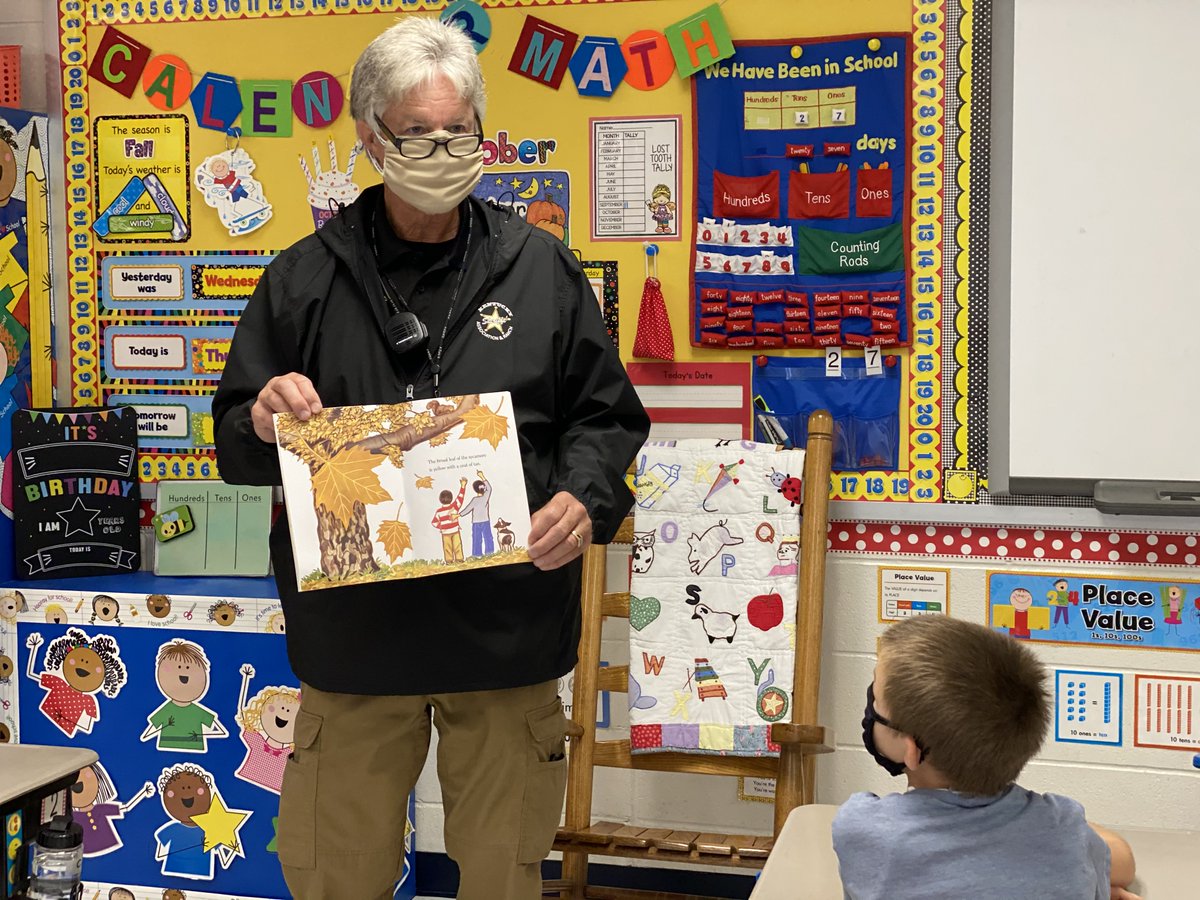 Shoutout to SRO Donnie Chambers, seen here reading to a class at Ben Johnson Elementary School in Breckinridge County. We see you, SRO Chambers!