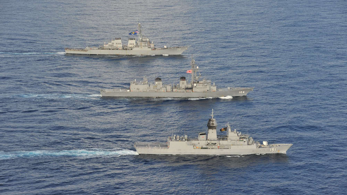 USPacificFleet's tweet photo. U.S., Japan, Australia conduct trilateral naval exercises in South China Sea: https://t.co/vTcTOY9XDw #NavyPartnerships #FreeandOpenIndoPacific https://t.co/ojtLehWX4i