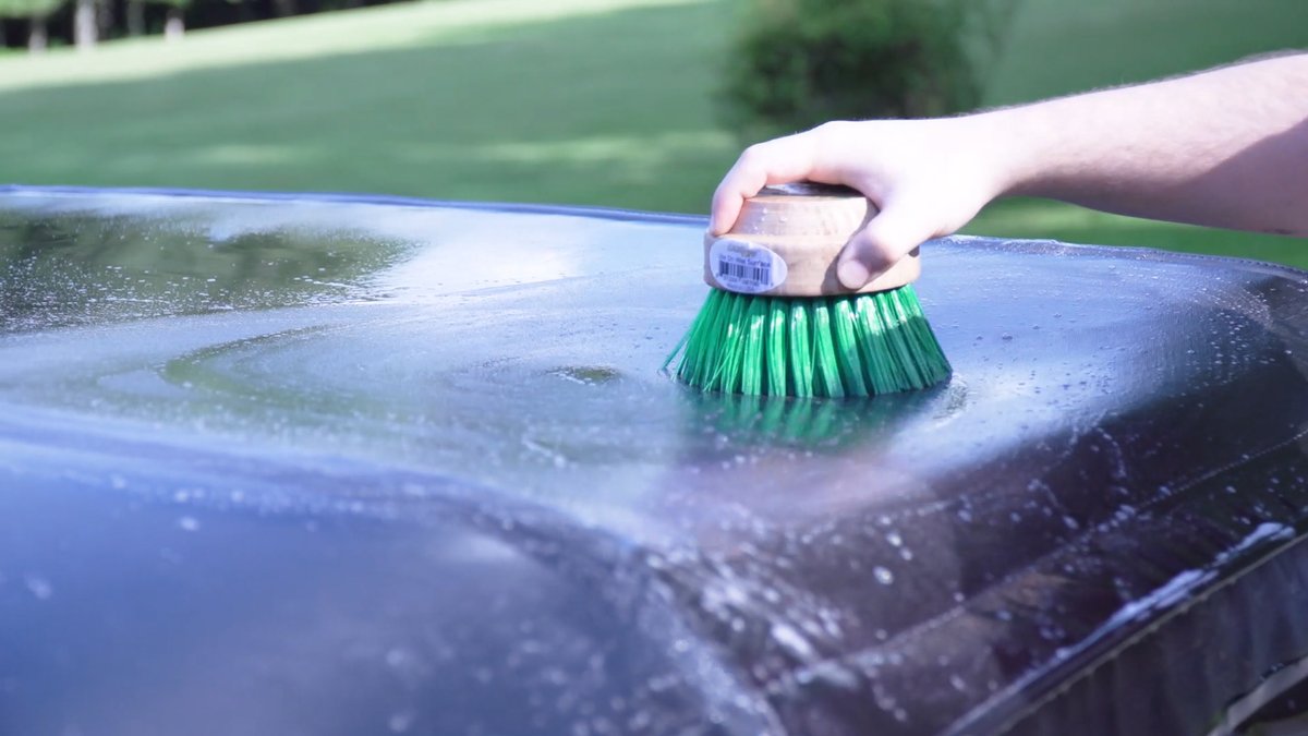 Haartz's tweet photo. Did your #Jeep get muddy running the trails? #DYK our #RaggTopp convertible brush can be used on your #Wrangler. Just apply cleaner and protectant and scrub. @wolfsteins #CarCareMonth https://t.co/UEYJtJKVlm