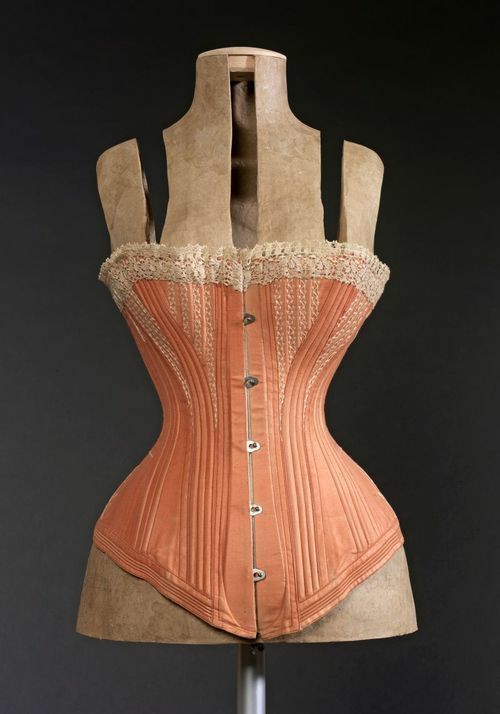 Here's a small selection of actual historical corsets!I want you to look at them for a bit -- especially the first one! Do you see how the shapes aren't absurdly dramatic? They're a more natural curve and the first one doesn't even have much of a dramatic shape at all