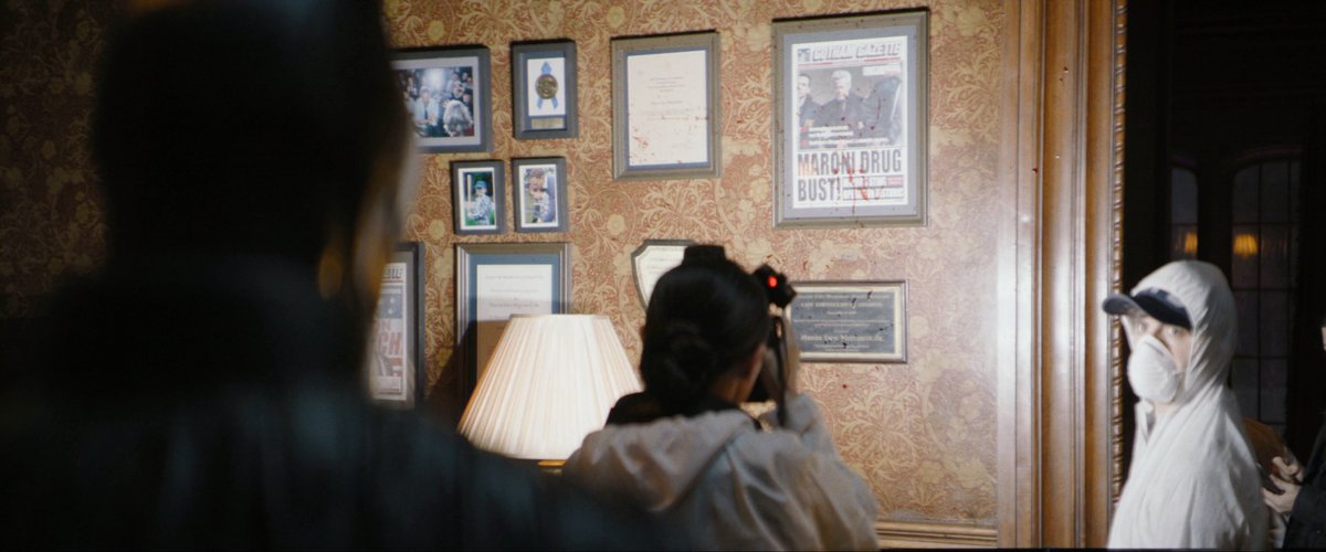 At the heart of this mystery in  #TheBatman is the corruption between the Falcone mob & govt. officials. On the corrupt mayor’s wall is a news clipping that says “MARONI DRUG BUST: Mayor’s Sting Operation Historic”. I believe the drug it refers to is Drop.