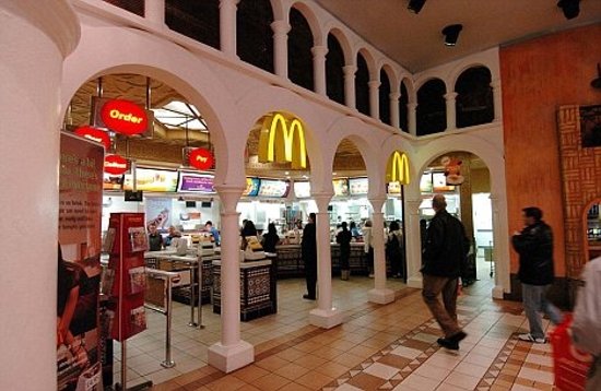 the renovated trafford centre food court, "the orient", does also feature a mcdonald's, seen here. it is, however, a fraction of the former location's size.