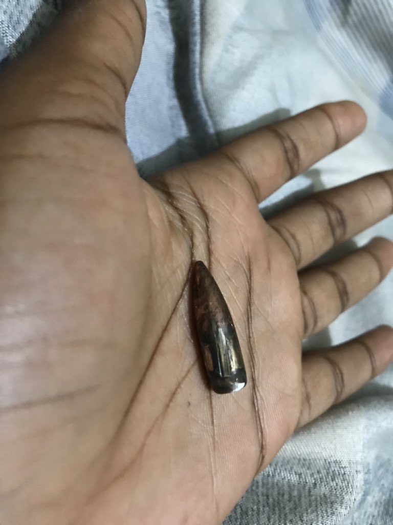 Posting this for awareness to show that we're not even safe in our homes either, I was literally laying on the bed when this bullet came in through the roof 😭 #EndSARS #EndPoliceBrutalityinNigera