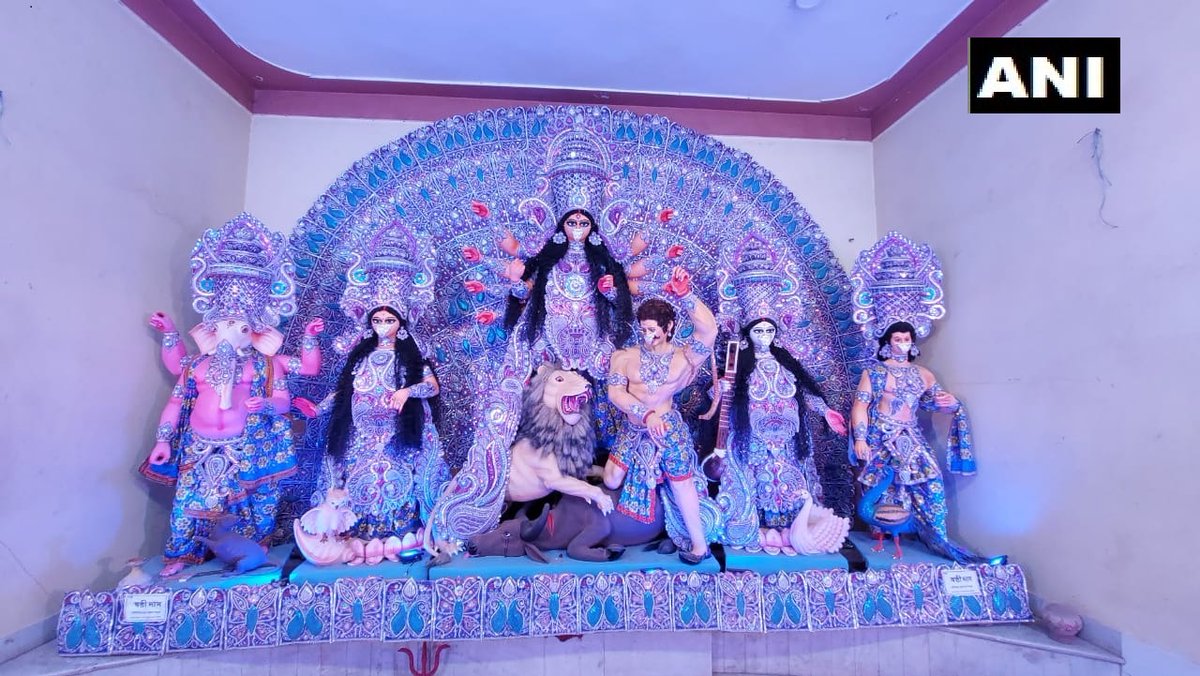 West Bengal: Durga idol at a puja pandal in Sainthia of Birbhum district will be seen wearing a mask this #DurgaPuja - depicting a theme of #COVID19 pandemic, in a bid to request people to not step out of their homes without wearing a mask. https://t.co/Oa1iEQWI2C