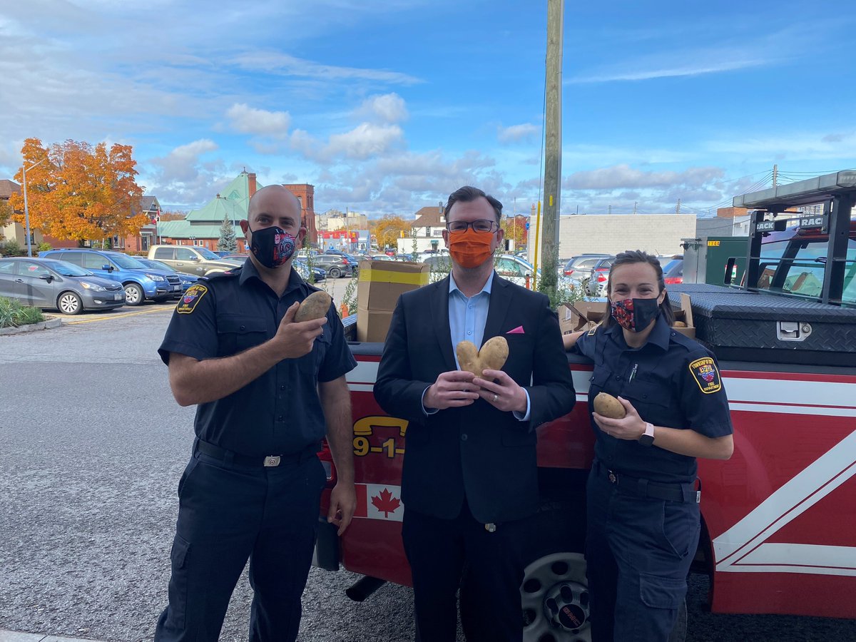 tinytownship's tweet photo. The Township of Tiny On-Call Firefighters make a donation of over 800lbs of potatoes to the The Guesthouse Shelter in Midland. Steffen Walma, Deputy Mayor, Nathan Sykes, Chief Executive Officer, The Guesthouse Shelter in Midland, and Haley Piitz, on-call Firefighter. https://t.co/bGJPUgH2UT