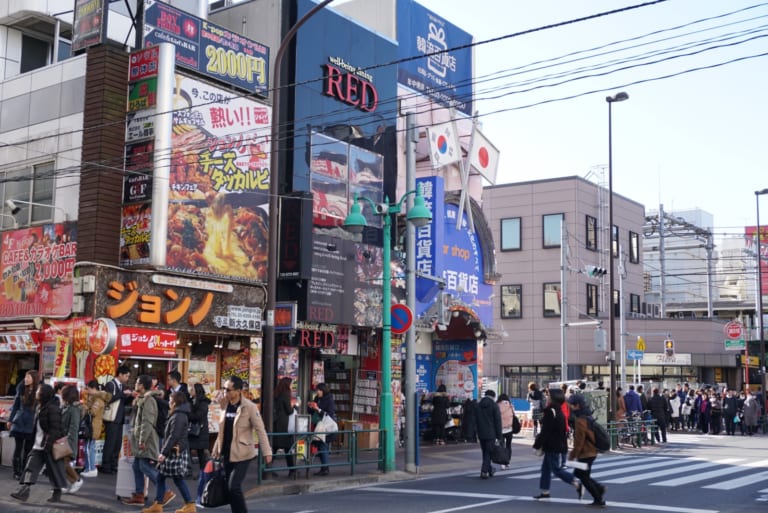 Shin Okubo, the Korean district in Tokyo, grew popular from 2004-2015-- previously, it had been a "disreputable" part of town where a large number of ethnic Korean people lived. Fans of K-pop now go to this area to indulge in Korean food, music, beauty products, and language.