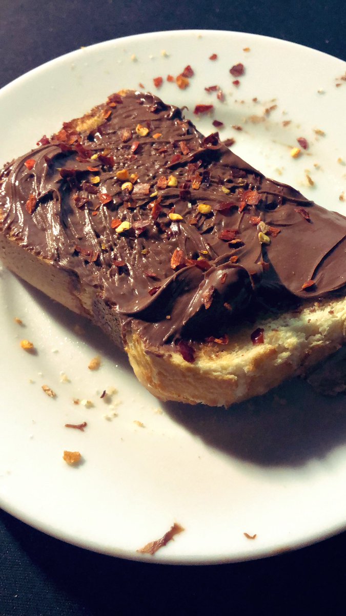 twowheelmusing's tweet image. It is not national Nutella day, I don’t even know if there is one, though this is my second #Nutella post today! Voila! Nutella on toast with chilli sprinkles bathed in the light of my monitor. If my monitor light was sunlight I’d be proper crispy!