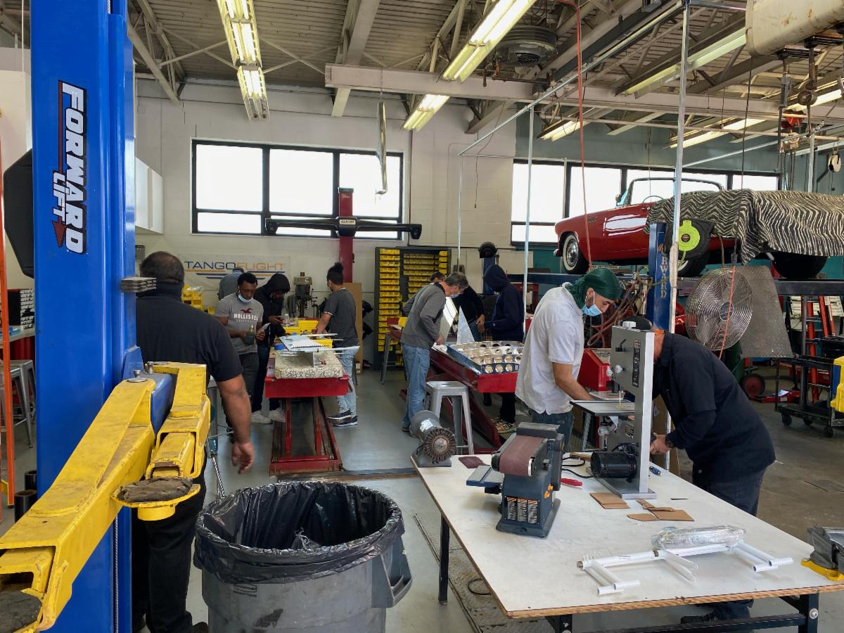 Students and Mentors, from Bassick High School, working on N568TF. 
We can just see the finished RV-12iS already!
