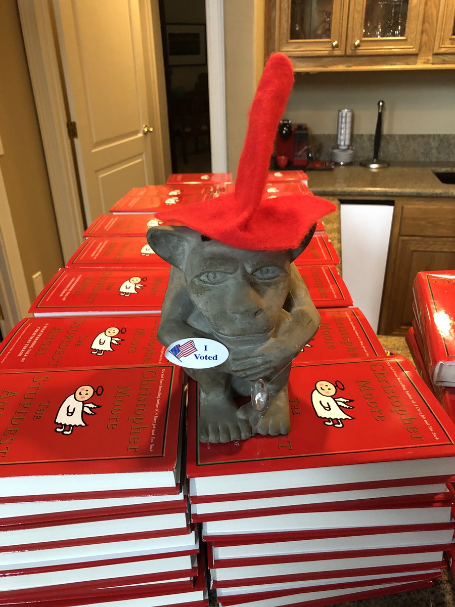 TheAuthorGuy's tweet image. Dido lives on the mantle year round, but about 15 years ago we made him a hat for Christmas and he’s never taken it off. Today he’s guarding The Stupidest Angels until I sign them.