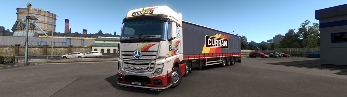 Curransofbangor's tweet photo. The ultimate in transport eating tar in the virtual world! #EuroTruckSimulator2 @SCSsoftware @MercedesTruckUK @MB_Truck_Van_NI https://t.co/ma7gKECbJU