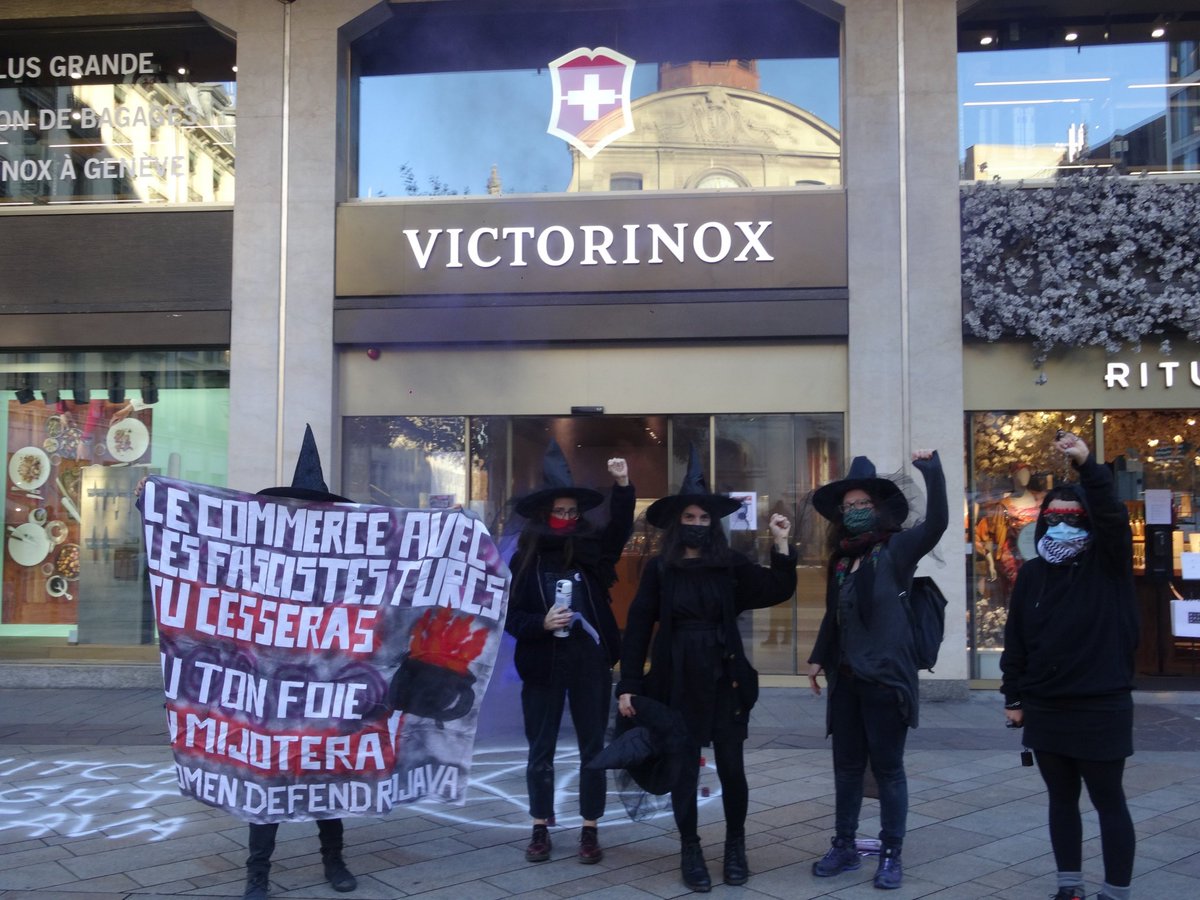 Feminist activists of the campaign  #womenDefendRojava protest in witch costumes in front of the Swiss company  @Victorinox in  #Lausanne. The company also supplies the Turkish army. Let's make them stop! #WitchesFight4Rojava  #Boycottturkey  #RiseUpAgainstFascism