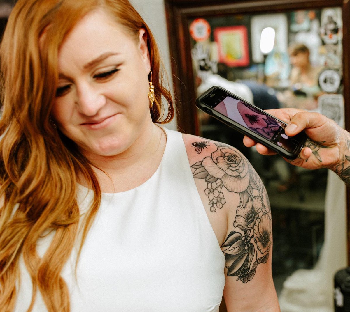 theknot's tweet photo. Inked and in love. 🖤 "Our wedding was lowkey bee-themed because we met on Bumble," Kate says. "Tyler and I like to get tattoos when we travel, so we decided, in keeping with the bee theme, to get matching bee tattoos on our way to the reception." 📸: Love To The Core Photo https://t.co/mMlc89a56I
