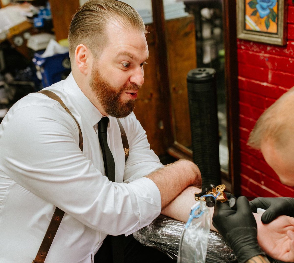 theknot's tweet photo. Inked and in love. 🖤 "Our wedding was lowkey bee-themed because we met on Bumble," Kate says. "Tyler and I like to get tattoos when we travel, so we decided, in keeping with the bee theme, to get matching bee tattoos on our way to the reception." 📸: Love To The Core Photo https://t.co/mMlc89a56I